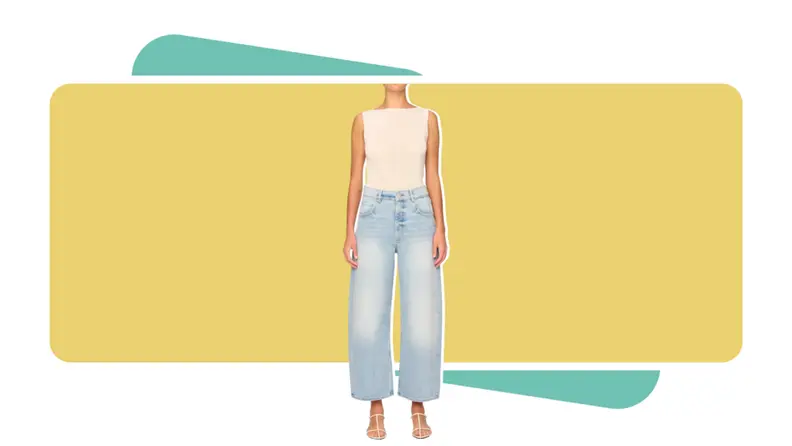 A model wearing faded jeans.