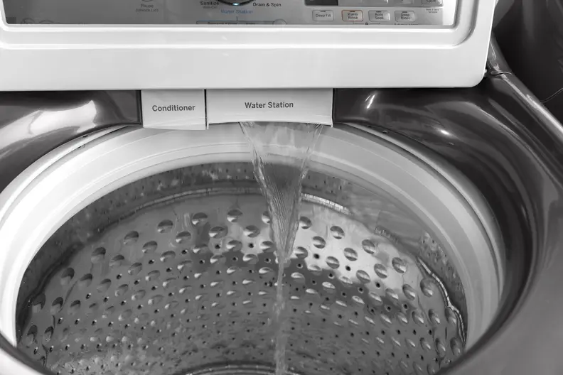 This GE top-load washer has a "faucet" inside
