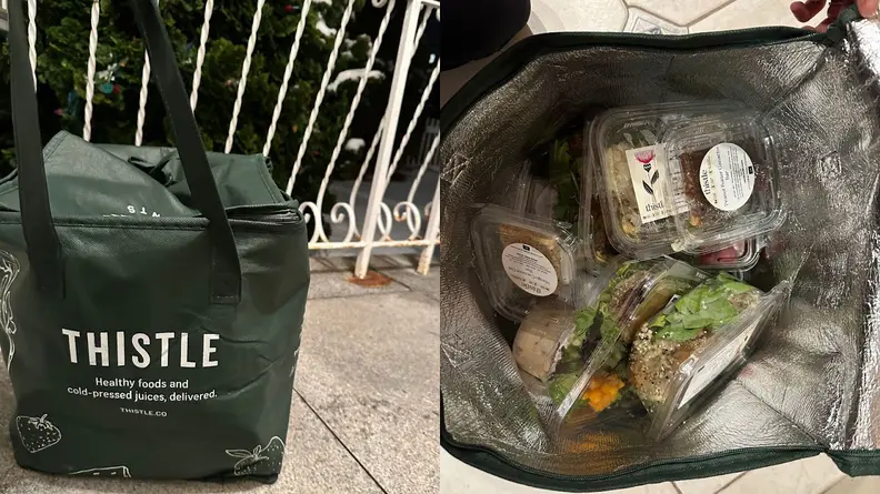 Thistle reusable, insulated bags with multiple plastic food containers inside.