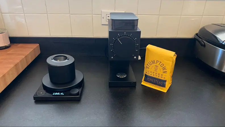 The Tally scale next to a bag of Stumptown coffee.