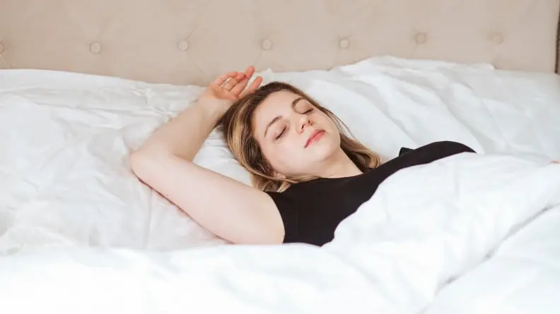 woman sleeping on silk pillowcases