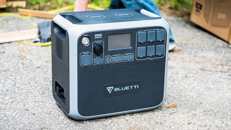 A solar-powered generator sits outside.