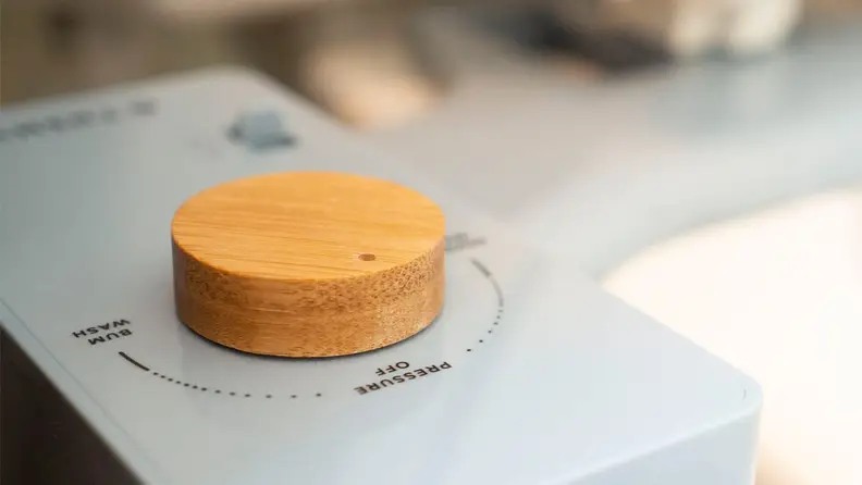 Close up of a Tushy bidet remote.