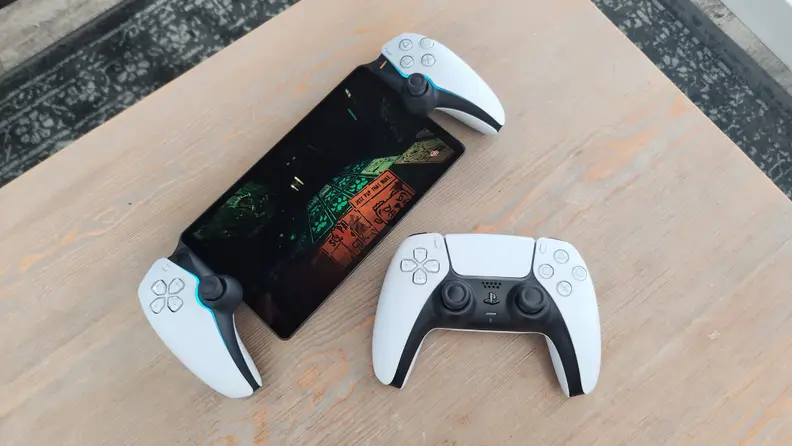 The PlayStation Portal to the left of a PlayStation 5 DualSense controller