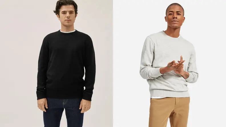 Man wearing black crewneck sweatshirt from Everlane, man folding hands while wearing a grey Everlane sweatshirt.