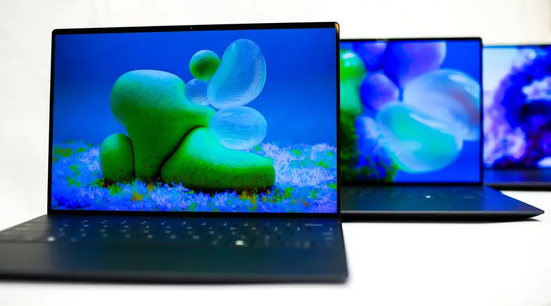 Three laptops in a staggered line