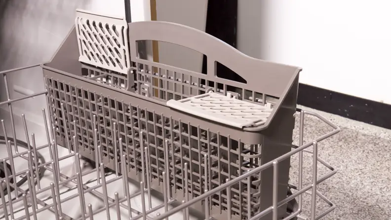 The silverware basket is removable and has slots for individual pieces