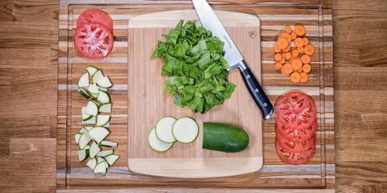 Flipping cutting board to cut down on mess