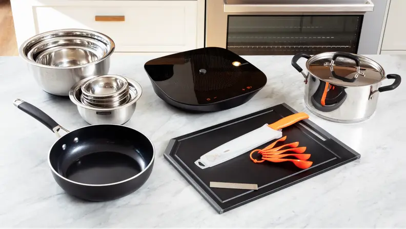 The full Tramontina Guru set laid out on display on a countertop.