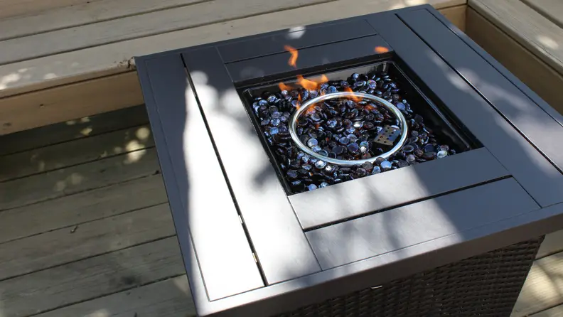 The Best Choice Fire Pit table shown ignited