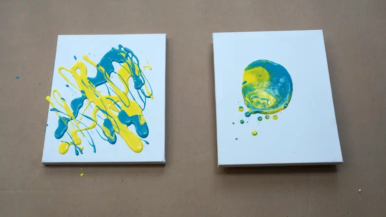 Two canvases with paint on them