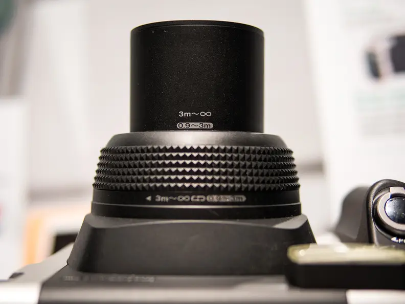 The lens barrel has markings to show which focus zone you're in.
