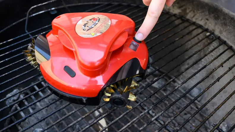 Grillbot button being pressed