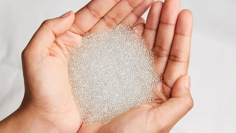 Because of its inner beads, this comforter is spot clean only.