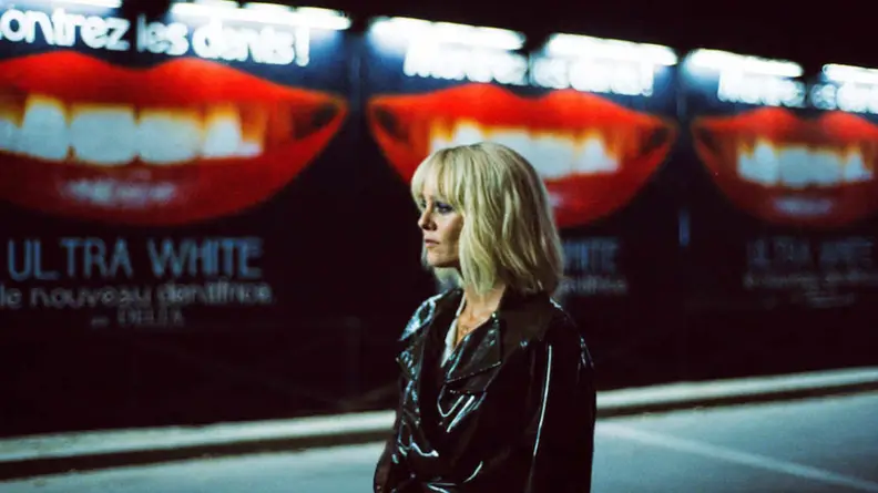Vanessa Paradis walks in a street, in a scene from "Knife and Heart."