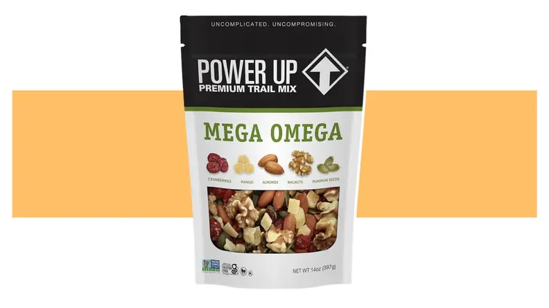 A Power Up bag of trail mix on an orange background.
