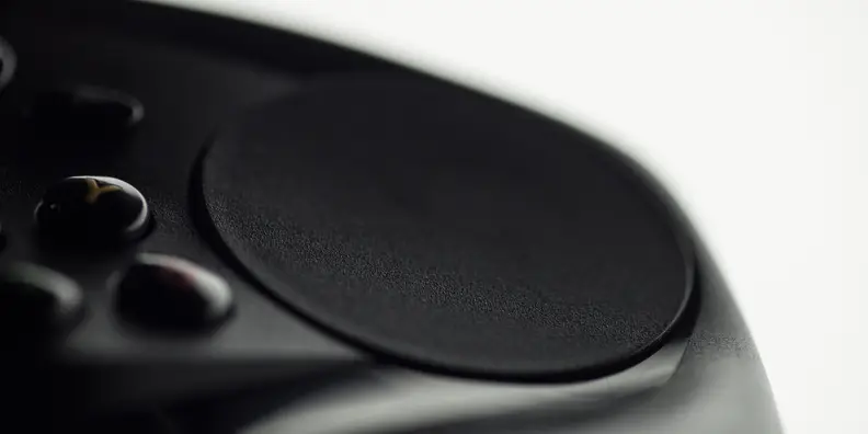 A close-up photo of the Valve Steam Controller's right touchpad.