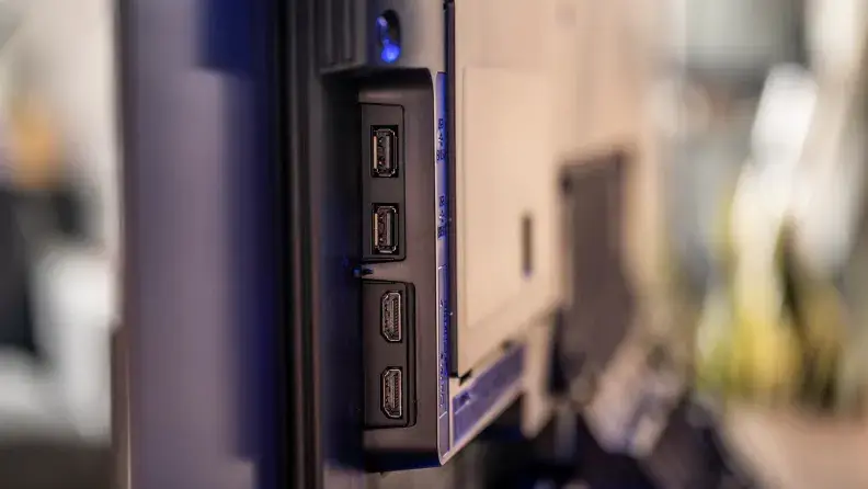 A close-up of the ports on the back of the Samsung S95B's panel