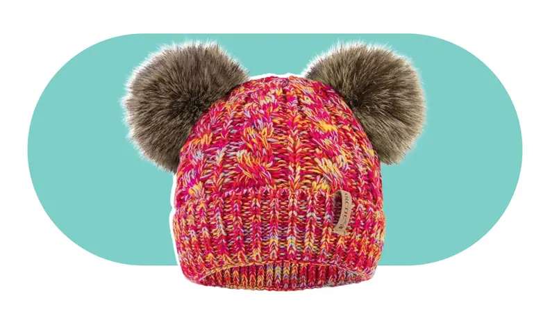 A red knit hat with two faux fur pom-poms on top.