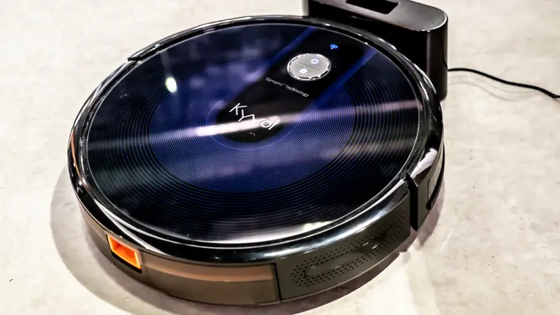 The Kyvol Cybovac robot vacuum is charging in its dock