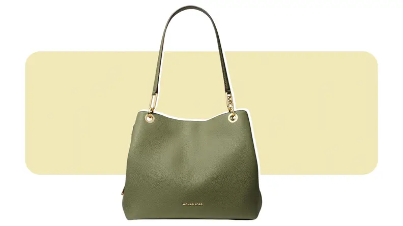 A large green leather bag with gold hardware.
