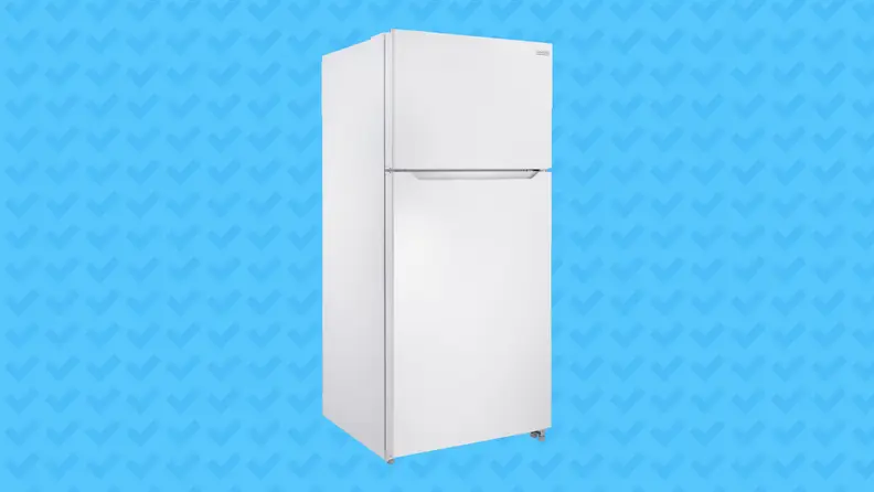 The Insignia NS-RTM18WH7 fridge on a blue checked background