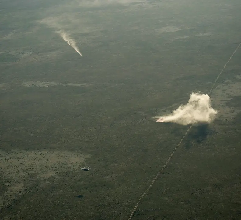 Ground Personnel Race to Soyuz Landing Site