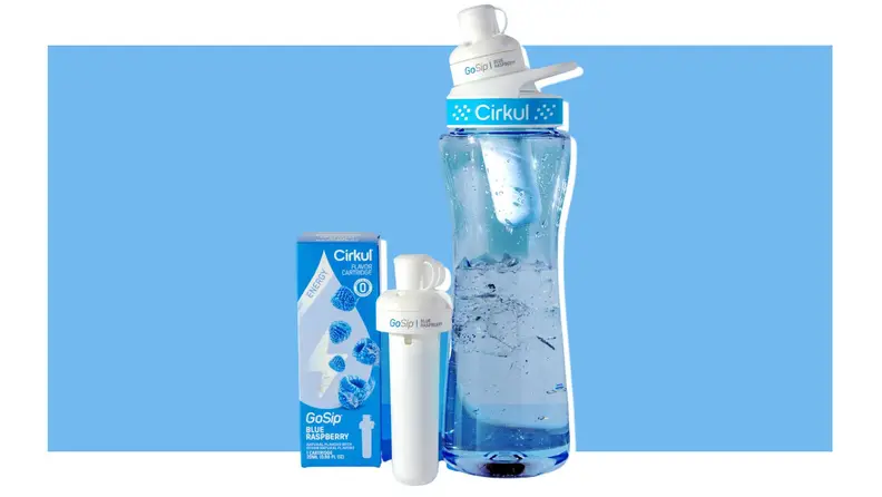 The Cirkul bottle and its packaging contents in front of a blue background.