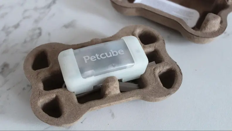 The Petcube GPS Tracker in its packaging.