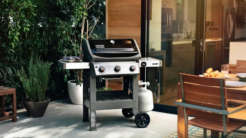 Keep your home cool by cooking outside on this Weber grill.