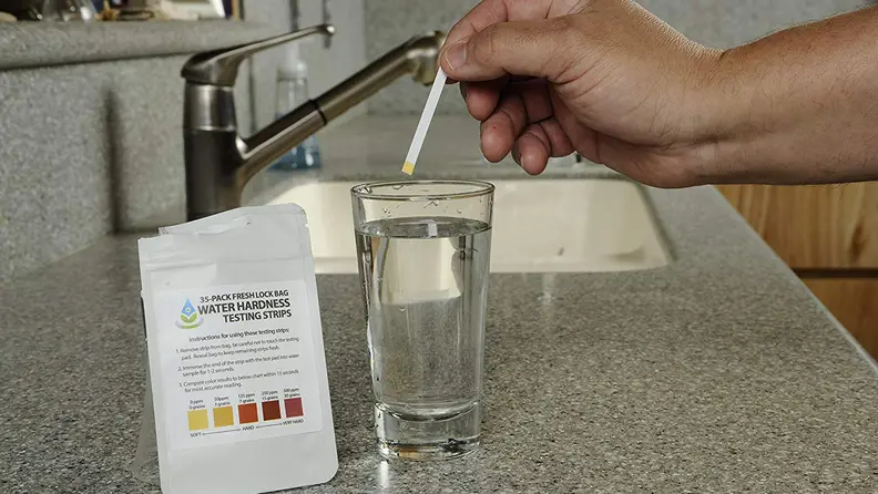 You can purchase strips to test your water for hardness.