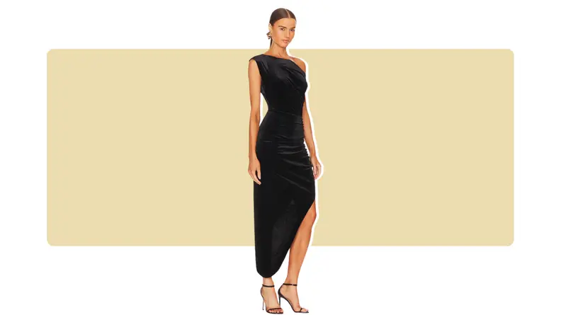 An asymmetrical black velvet dress.