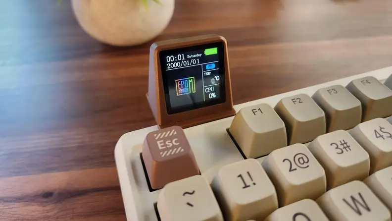 Close-up of the keyboard's mini TV screen.