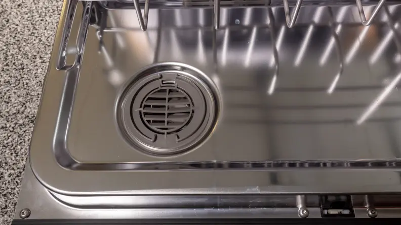 The dishwasher's fan helps to dry the dishes