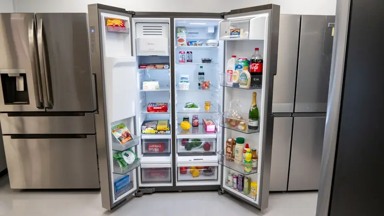 Stainless steel Midea MRS26D5AST Side-by-Side Refrigerator with both doors open.