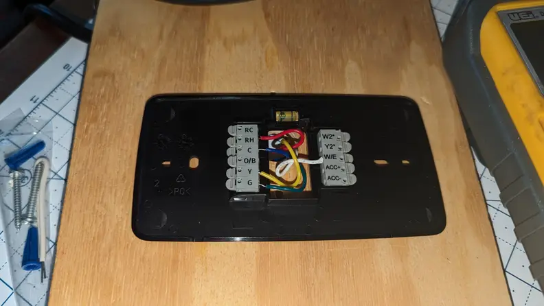 The image shows the thermostat wiring behind a Sensi Touch 2, including a C-wire.
