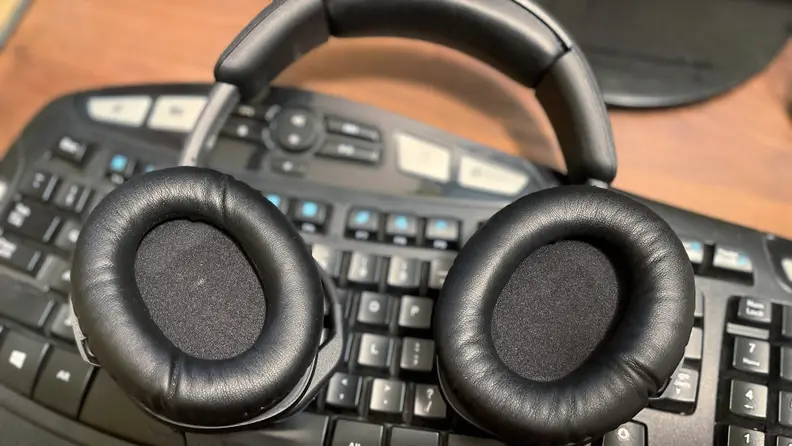 The HyperX Cloud Stinger sitting on a keyboard.