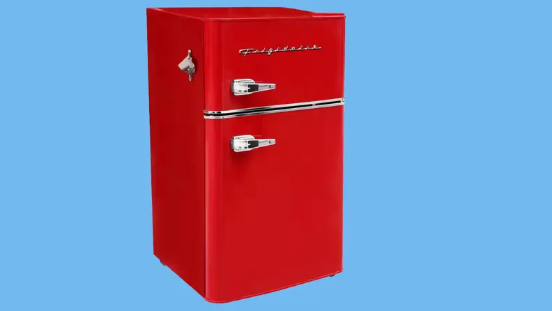 The Frigidaire EFR840 mini fridge on a blue background.