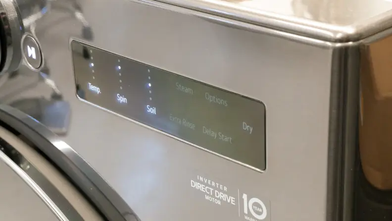 LG WM6998HBA washer-dryer machine, including “temp,” “spin,” and “soil.”
