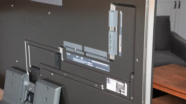 The back of an LG OLED TV with visible ports and connections.