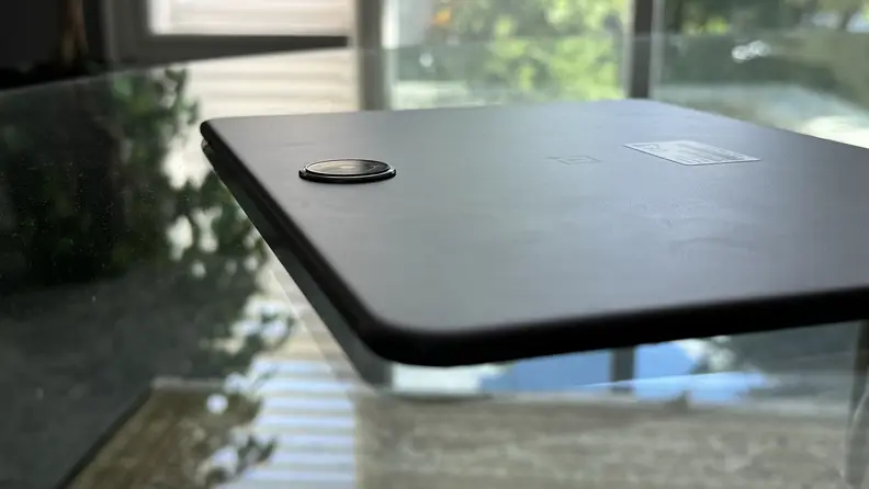 The OnePlus Pad 2 on a glass table.