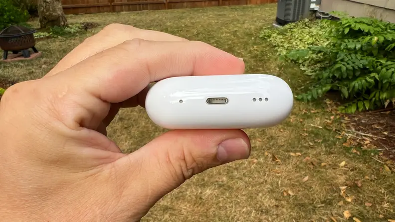 A close-up of the case of the Apple AirPods Pro (second gen) with charger port displayed.