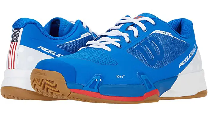 A pair of blue pickleball sneakers on white background
