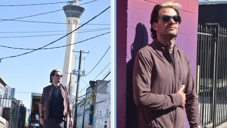 A man modeling the track jacket in Downtown Las Vegas.