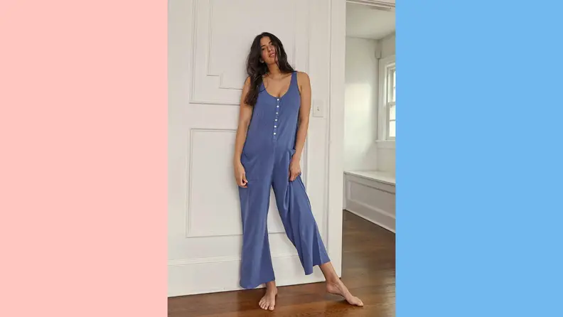 A woman posing in Hatch wear.