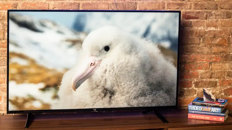 The Amazon Fire TV 4-Series displaying 4K/HDR content in a living room setting