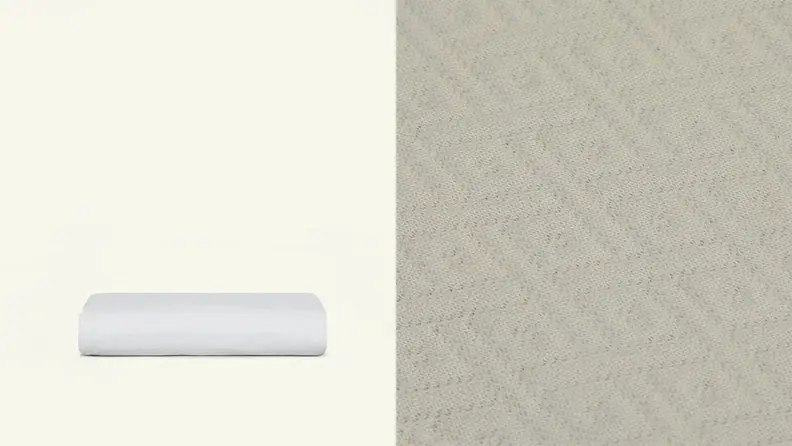 On left, folded mattress protector.