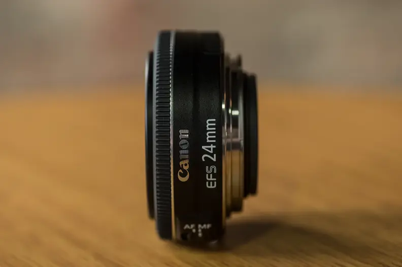 The Canon EF-S 24mm f/2.8 STM is a pancake lens making it extremely light and thin.