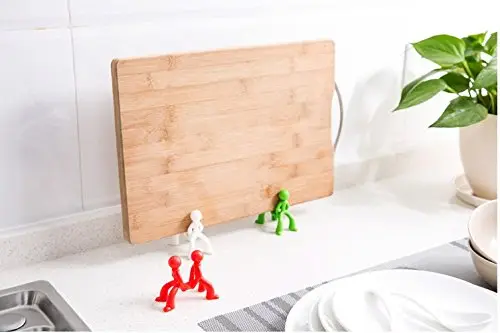 These little men are strong enough to hold up your chopping board.