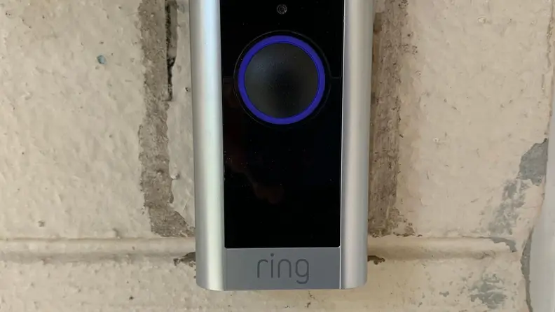 An up-close picture of the Ring Video Doorbell Pro 2 hanging on a home.